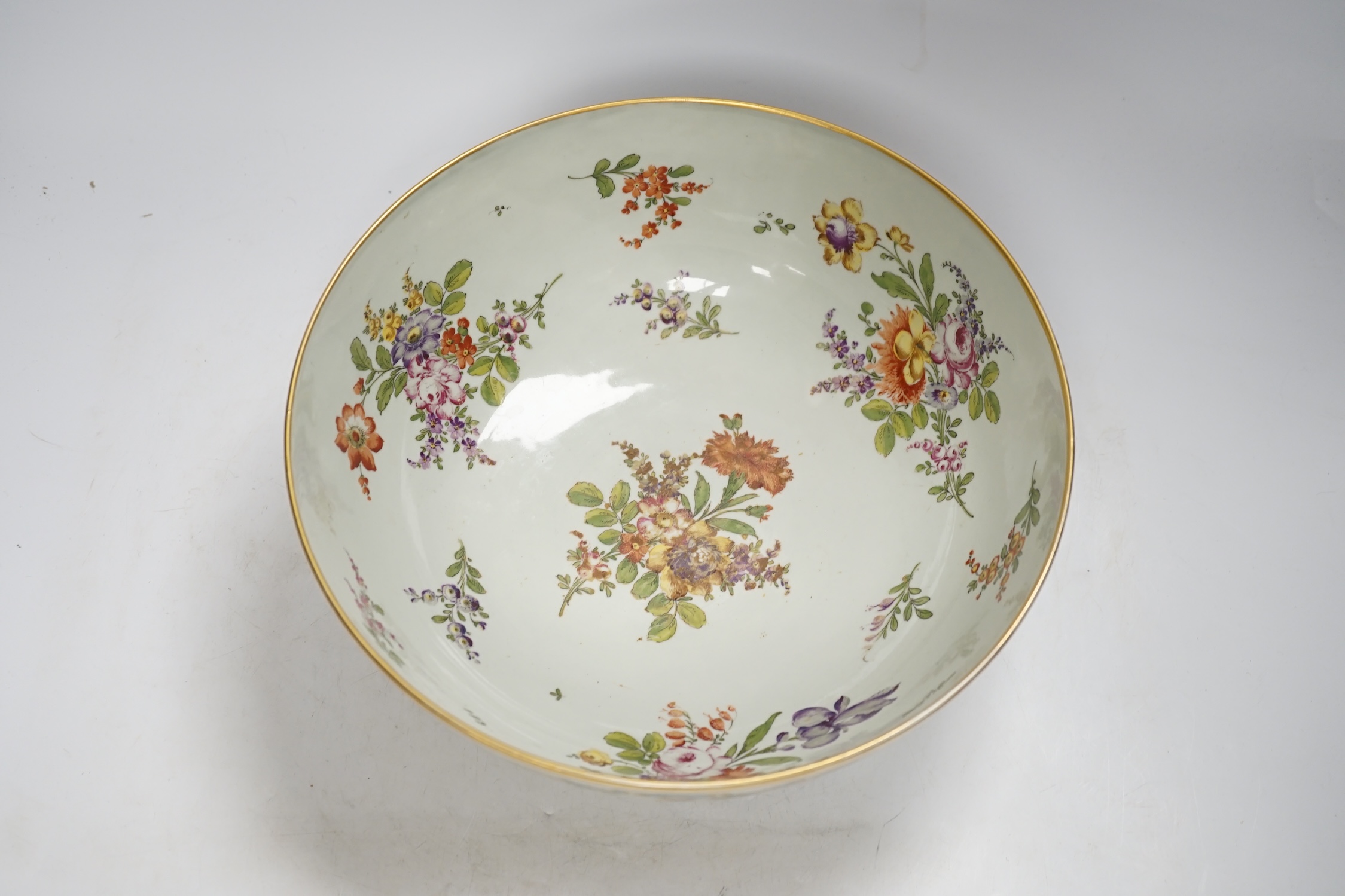 A large Continental Chelsea style floral painted bowl, 28cm diameter